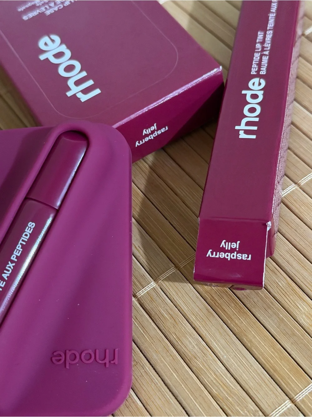 Rhode lip tint and snap-on lip case set in raspberry jelly